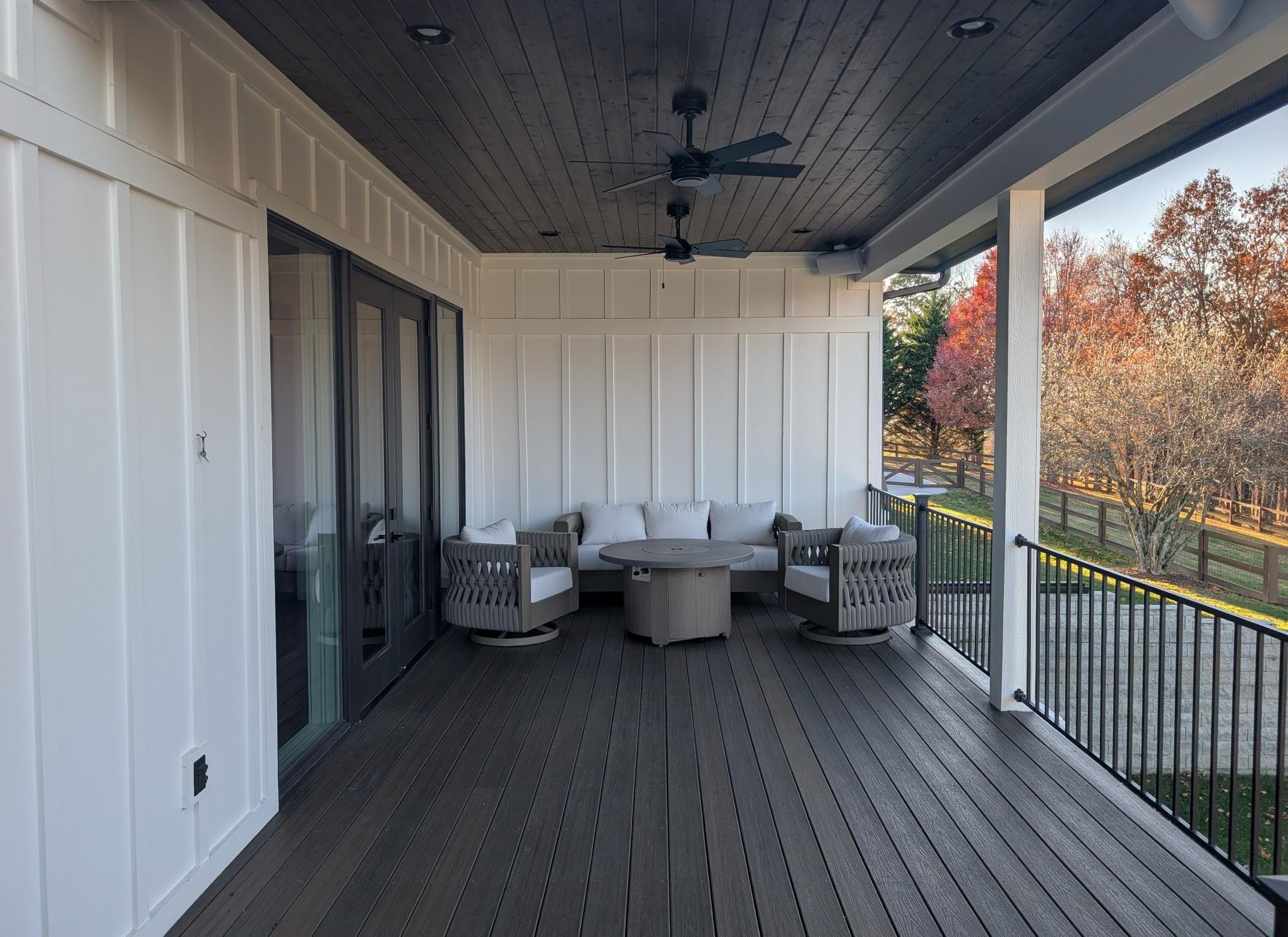 Edmondson covered upper deck with stained tongue-and-groove ceiling and board-and-batten walls